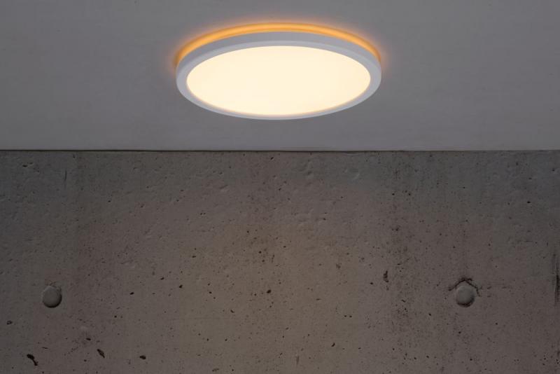 Flache LED-Deckenleuchte Oja 24cm mit Lichtkranz an der Decke für ein modernes Wohnambiente